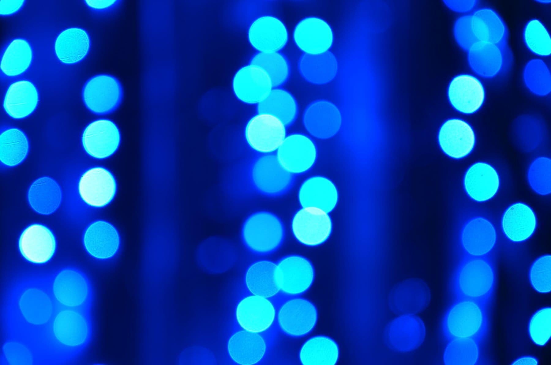 Abstract blue lights defocused into soft bokeh